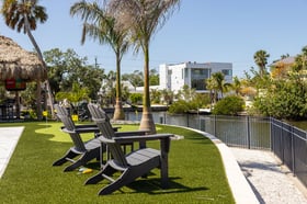 artificial turf putting green backyard water patio